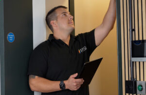 a fire inspector conducting a fire door check